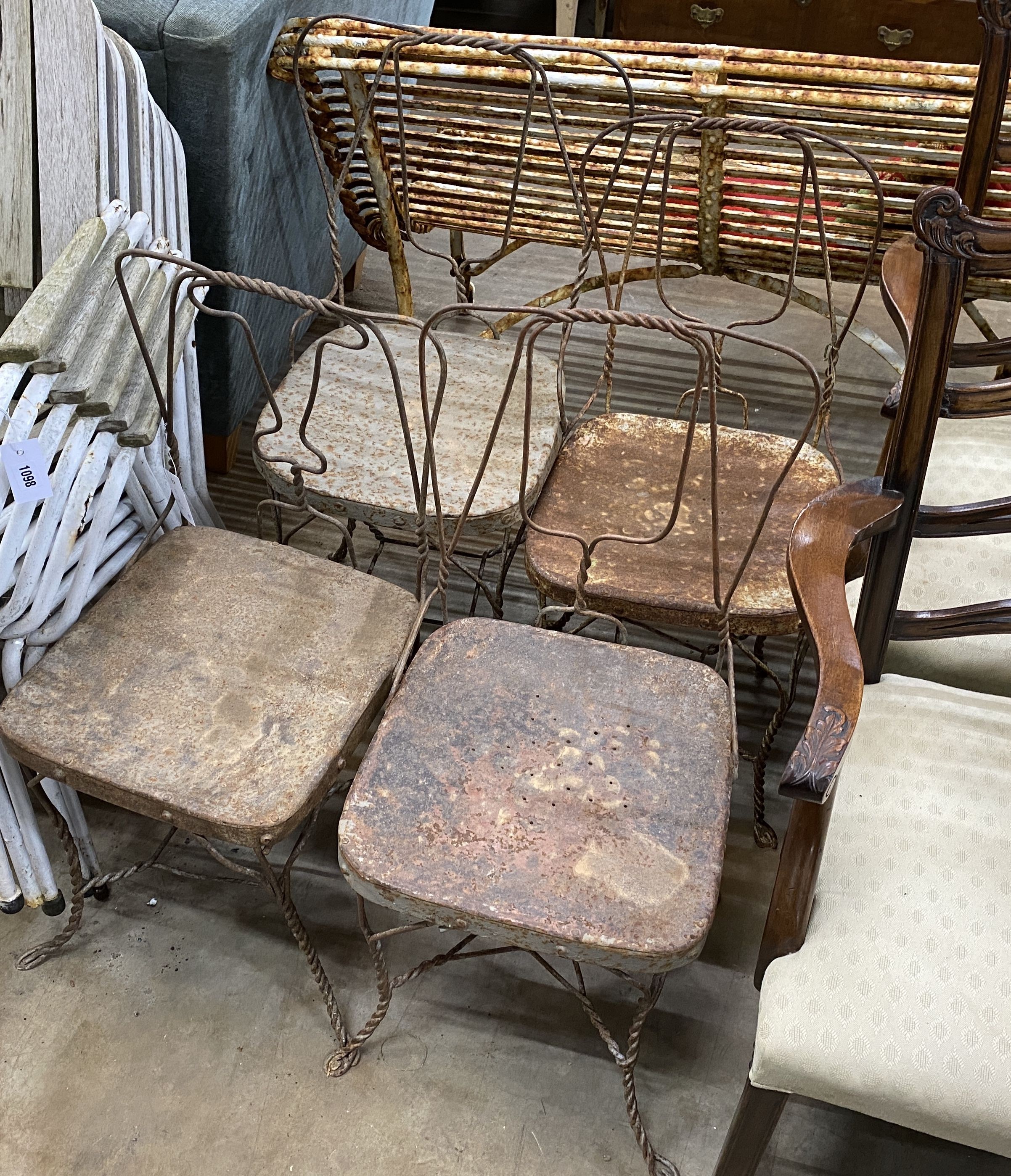 Four vintage wirework garden chairs